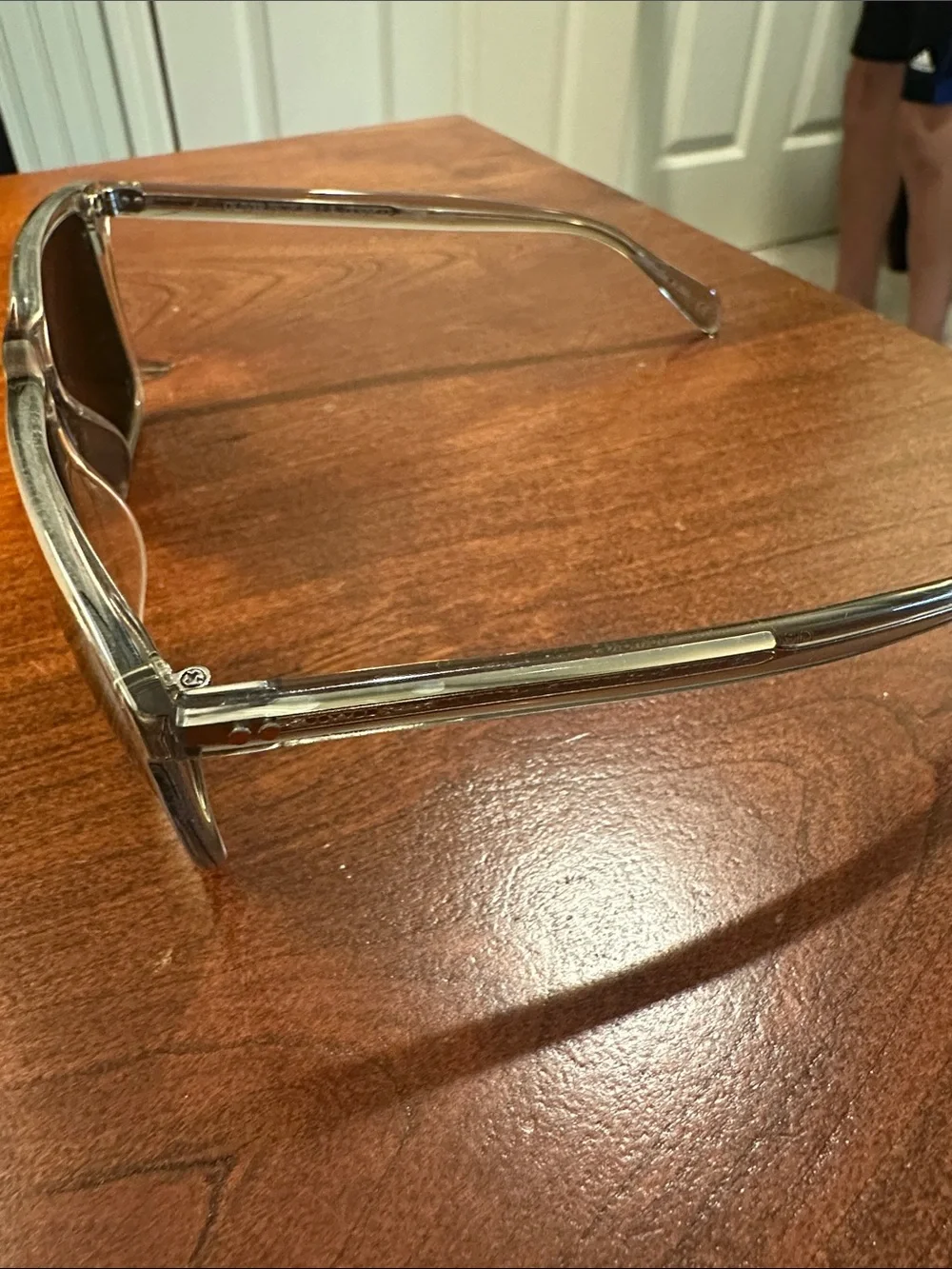 Oliver Peoples Clear Frame Sunglasses with Brown Lenses